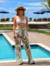 Calça de tule, fundo branco papagaio vermelho REF 49580