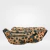 Riñonera Venecia de simil neoprene con estampado animal print en tonos marrones y negros.