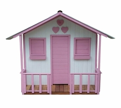 Casinha de boneca branca com detalhes em rosa, incluindo janelas e porta.