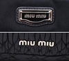 Bolsa Miu Miu Turnlock Top Handle Couro Nappa Matelassê na internet