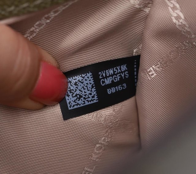 Bolsa Michael Kors Voyager Olive Tote na internet
