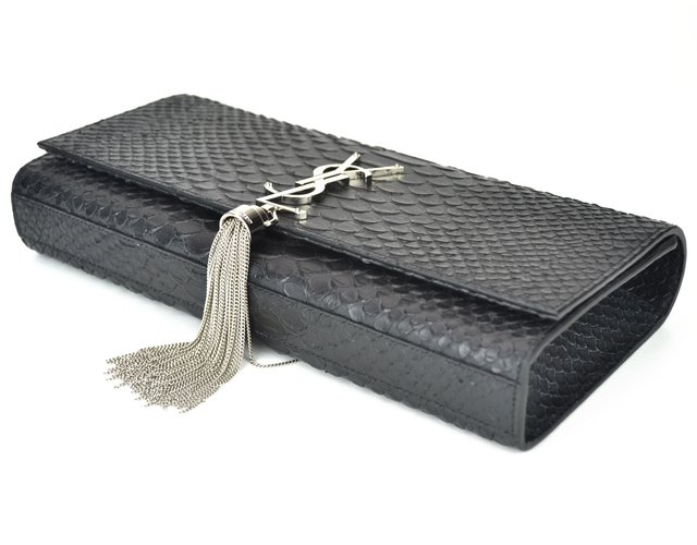 Bolsa Clutch YSL Cassandre Tassel em Couro