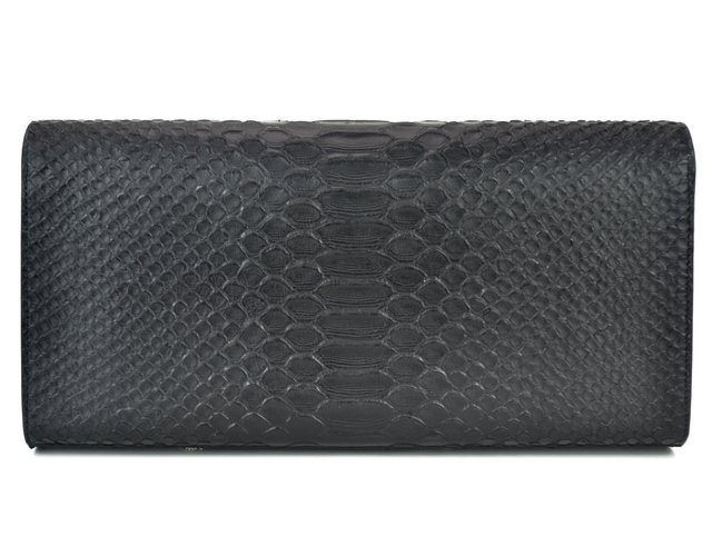 Bolsa Clutch YSL Cassandre Tassel em Couro na internet