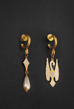 Aretes mini garza blanca en internet
