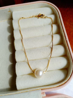 Pulseira Pérola Folheada com 1 milésimo de Ouro - com verniz cataforetico na internet