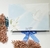 Caixa cartonada + necessaire carteira - Crisma ou Primeira comunhão - Flor Lembranças e caixas convite para padrinhos