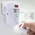 ALARMA INALAMBRICA A PILAS + 2 CONTROLES + SOPORTE DE PARED