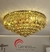 Lustre de Cristal Ø50 Harion Transparente iluminado em uma sala Lustres Gêneiss loja online de Lustres e Iluminação Decorativa