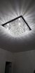 Lustre de Cristal Zecor Quadrado 60x60 iluminando ambiente interno. Lustres Gênesis loja online de Lustres e Iluminação Decorativa