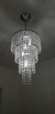 Lustre de Cristal Doma Ø60cm pendente iluminado em sala. Lustres Gêneiss loja online de Lustres e Iluminação Decorativa