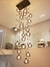 Lustre Pendente Sarvah com 30 globos conhaque espelhados em ambiente de pé direito duplo Lustres Gênesis Site online venda de Lustres e Iluminação