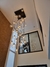 Lustre Pendente Sarvah com 36 globos fumê em uma base quadrada, ideal para casas com pé direito duplo ou alto. Lustres Gênesis loja online de Lustres e Iluminação Decorativa. 