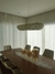 Lustre pendente retangular de cristal sobre mesa de jantar em ambiente elegante Lustres Gênesis loja online de Lustres e Iluminação Decorativa