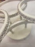 Plafon de Teto Sublimme Branco com 4 anéis de cristal da Nitrolux, ideal para quartos, salas de estar, hall de entrada e lavabos. Lustres Gênesis Site online venda de Lustres e Iluminação