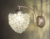 Arandela Dente de Leão 20x15cm de cristal, ideal para cabeceira de cama, lavabo e banheiro. Lustres Gênesis loja online de Lustres e Iluminação Decorativa