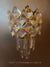 Arandela de Cristal King Dourada com design luxuoso e detalhes em cristal, ideal para quarto, cabeceira de cama, lavabo e quarto infantil. Lustres Gênesis loja online de Lustres e Iluminação Decorativa