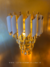 Arandela moderna de cristal lux Branca com design elegante, ideal para quartos, corredores, escadas, varandas e sala de estar. Lustres Gênesis loja online de Lustres e Iluminação Decorativa