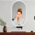 Espelho Moderno Touch Screen Oval com LED no banheiro, refletindo uma mulher sorridente usando uma toalha no rosto. Lustres Genesis loja online de Lustres e Iluminação Decorativa