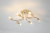 Lustre plafon moderno de 6 hastes em metal rose gold iluminando ambiente. Lustres Gênesis loja online de Lustres e Iluminação Decorativa.