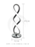 Luminária de mesa com design espiral cromado e LED integrado, medindo 45 cm de altura e 13 cm de largura. Lustres Gênesis Site online venda de Lustres e Iluminação