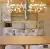 Lustre Pendente Moderno de LED Manacá Dourado em sala de jantar moderna Lustres Gênesis Site online venda de Lustres e Iluminação