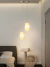 Pendente Moderno Plissado Branco em cabeceira de cama Lustres Gênesis Site online venda de Lustres e Iluminação