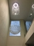 Lustre de Cristal Bola Dupla instalado em casa com pé direito duplo. Lustres Gênesis loja online de Lustres e Iluminação Decorativa