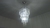 Lustre de Cristal Doma de Ø60cm iluminando uma sala de estar ou jantar. Lustres Gêneiss loja online de Lustres e Iluminação Decorativa