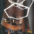 Lustre pendente moderno com LED em formato hexagonal, ideal para decoração de salas e quartos. Lustres Gênesis Site online venda de Lustres e Iluminação