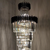 Lustre Pendente de Cristal Líbia Preto 260cm, ideal para casas com pé direito duplo ou alto, da marca Sindora. Lustres Gênesis Site online venda de Lustres e Iluminação Decorativa