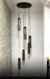 Lustre Pendente Dunáh Moderno com 6 Tubos Fumê em ambiente interno. Lustres Gênesis loja online de Lustres e Iluminação Decorativa
