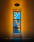 Lustre Pendente Sarvah com 8 globos âmbar em um ambiente com pé direito alto. Lustres Gênesis loja online de Lustres e Iluminação Decorativa