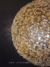Lustre pendente de cristal formato dente de leão iluminado, ideal para Quarto e lavabos. Lustres Gênesis loja online de Lustres e Iluminação Decorativa