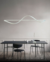 Lustre pendente de LED moderno Sigma preto instalado acima de uma mesa de jantar em um ambiente minimalista. DCD03215  Lustres Gênesis - o melhore site da Internet para comprar Lustre