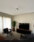 Luminária Plafon Espiral Jabuticaba com 9 globos instalada em sala de estar moderna Lustres Gêneis loja online de Lustres e Iluminação Decorativa