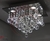 Lustre de cristal em formato de pirâmide com design elegante, ideal para sala de estar, sala de TV, quartos, hall de entrada e escritórios. Lustres Gênesis loja online de Lustres e Iluminação Decorativa