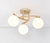 Luminária de teto moderna com três globos brancos em espiral, ideal para sala de estar. Lustres Gêneis loja online de Lustres e Iluminação Decorativa