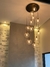 Lustre Pendente Sarvah com 12 globos em base redonda preta, ideal para pé direito duplo e alto. Lustres Gênesis loja online de Lustres e Iluminação Decorativa
