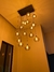 Imagem do Lustre Pendente Sarvah 15 Globos Âmbar Para Casas Pé Direito Duplo e Alto.