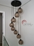 Lustre pendente Sarvah moderno com 8 globos fumê espelhados, ideal para escadas e ambientes com pé direito duplo e alto. Lustres Gênesis Site online venda de Lustres e Iluminação decorativa