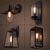 Lâmpadas de Filamento de Carbono Vintage Retro ST64 em luminárias de parede Lustres Gênesis loja online de Lustres e Iluminação Decorativa