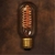 Lâmpada de Filamento de Carbono T45 40W Spiral com design vintage e filamento espiral aceso. Lustres Gênesis loja online de Lustres e Iluminação Decorativa