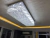 Lustre de cristal retangular Zangcham iluminando uma sala de estar moderna. Lustres Gênesis loja online de Lustres e Iluminação Decorativa