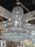 Lustre de cristal clássico com acabamento cromado e cristais transparentes, ideal para sala de jantar. Lustres Gênesis loja online de Lustres e Iluminação Decorativa