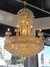 Lustre de cristal clássico Cuba dourado com cristais transparentes, ideal para sala de jantar e buffet. Lustres Gênesis loja online de Lustres e Iluminação Decorativa