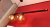 Pendente Moderno Fiora com 2 globos em ambiente com parede vermelha. Lustres Gênesis loja online de Lustres e Iluminação Decorativa. 