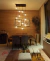 Lustre pendente Sarvah com 12 globos transparentes iluminando sala de jantar moderna Lustres Gênesis loja online de Lustres e Iluminação Decorativa