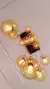 Lustre Pendente Sarvah com 12 globos âmbar para pé direito duplo e alto. Lustres Gênesis loja online de Lustres e Iluminação Decorativa