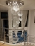 Lustre de Cristal Yôda Ø105cm instalado em ambiente com pé direito duplo. Lustres Gênesis Site online venda de Lustres e Iluminação