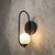 Arandela de parede Shen 60cm com design industrial, ideal para quartos e cabeceira de cama. Lustres Gênesis loja online de Lustres e Iluminação Decorativa